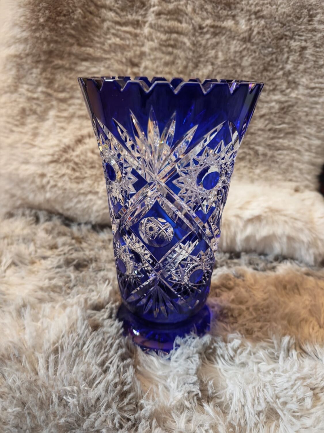 Bohemian vase in cut crystal with blue overlay.
