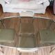 Table and 4 70s chairs chrome base and smoked glass tray chairs green water fabric
