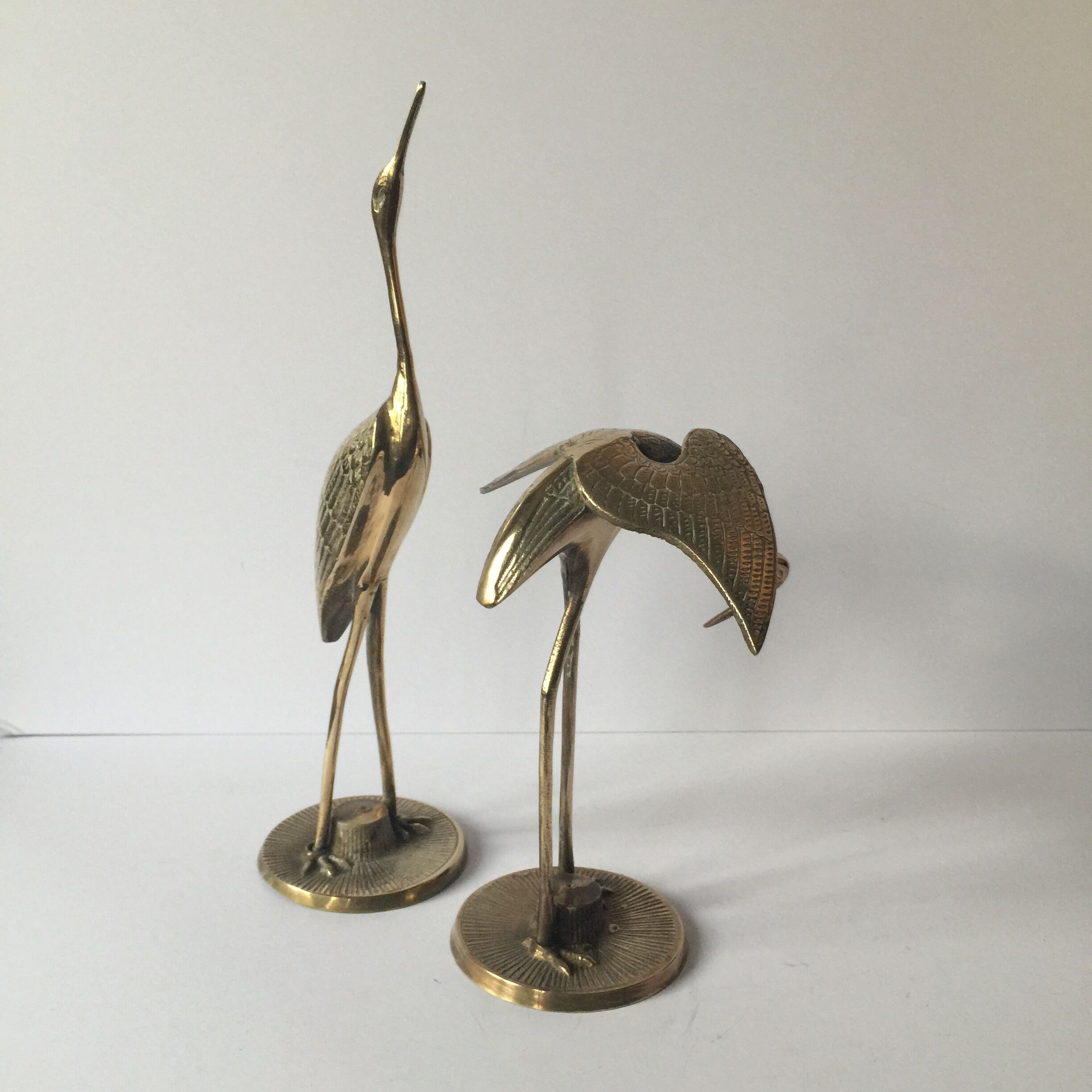Couple of brass birds