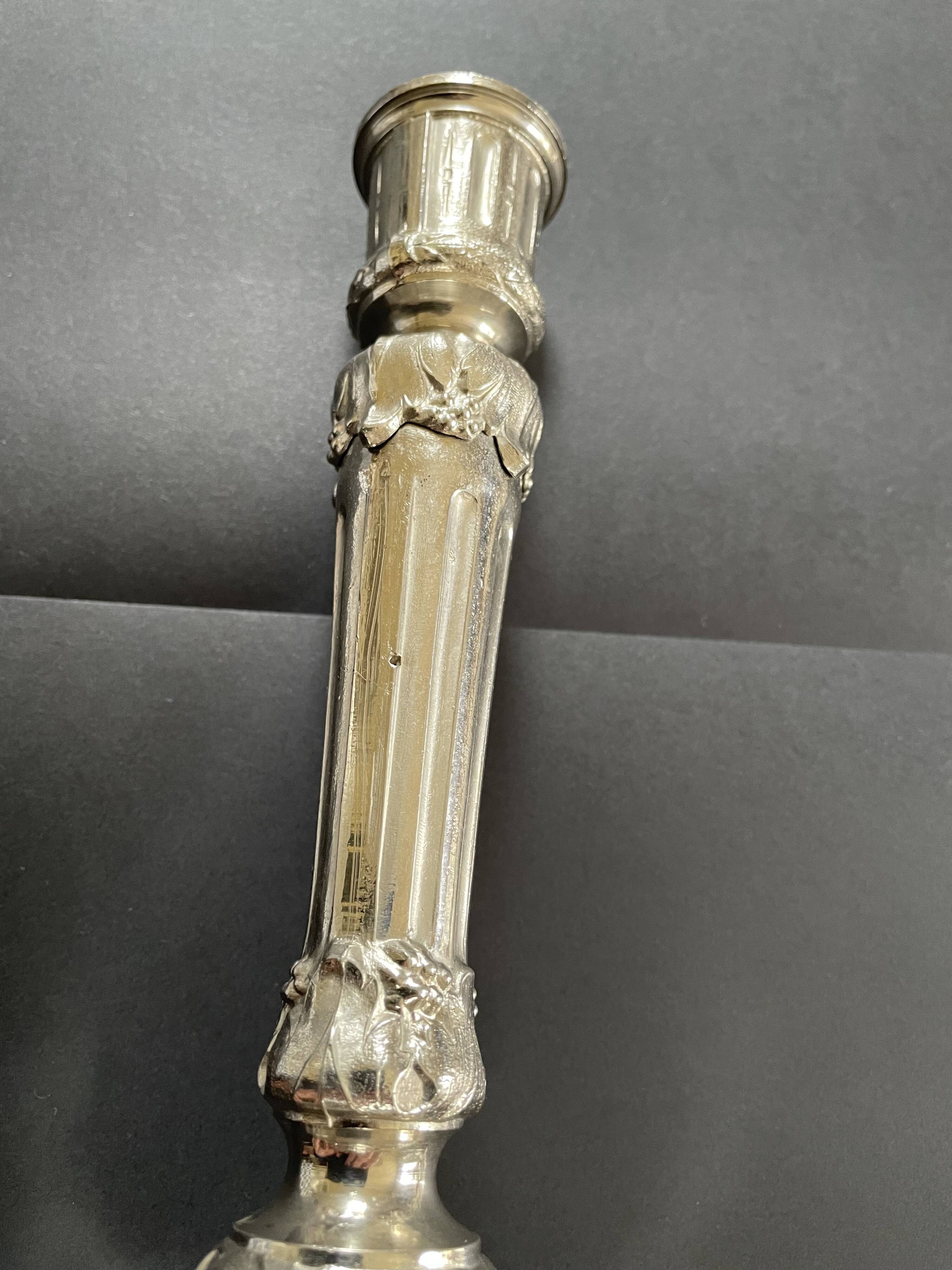 Antique silver-plated candlesticks in classic style