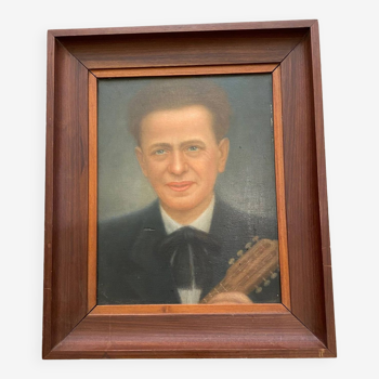 Portrait à l'huile d'un homme et sa guitare, années 40