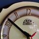 Vintage formica clock silent asymmetrical wall pendulum "FFR Morbier yellow black"