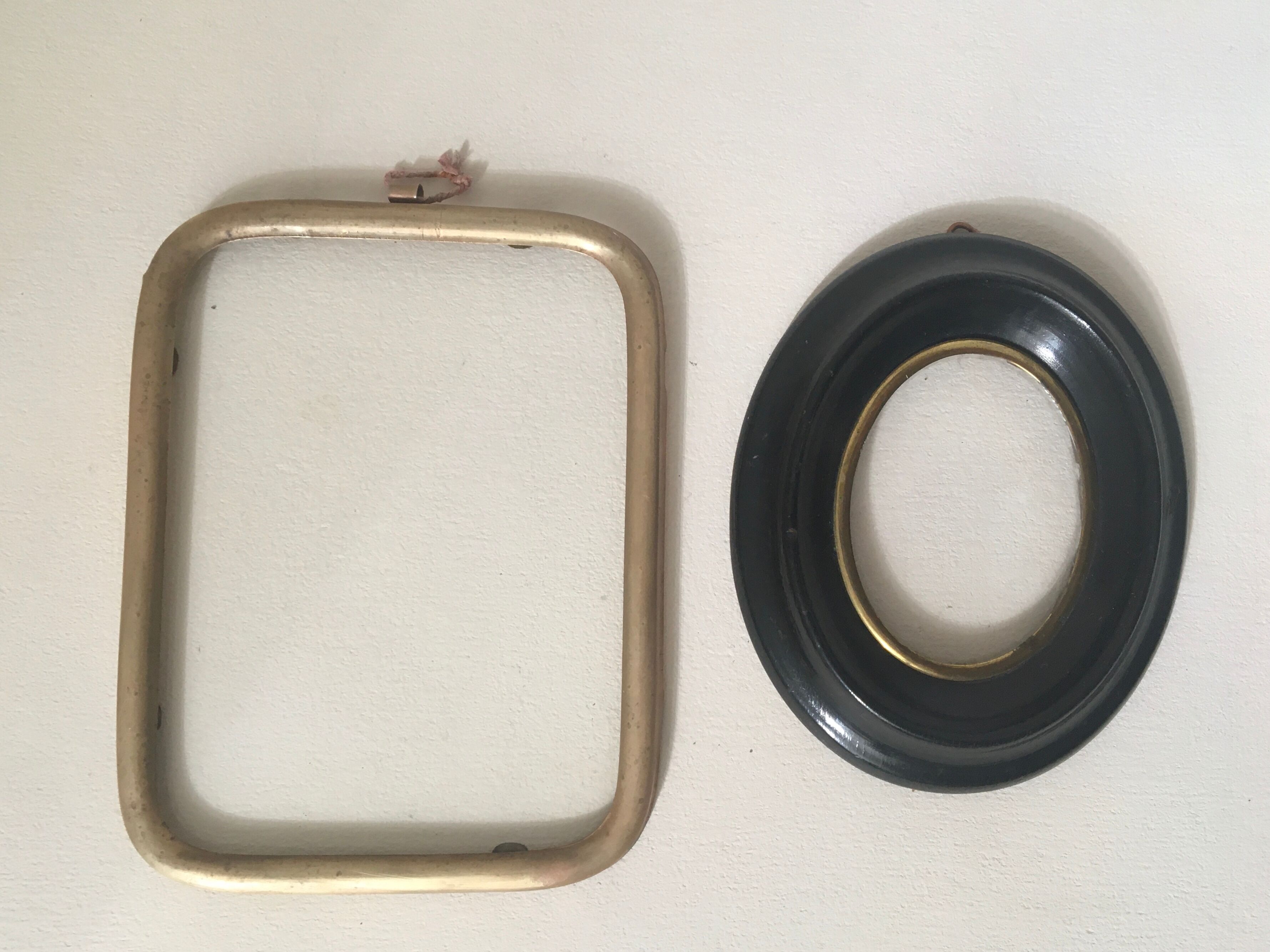 Set of wooden and brass frames with windows