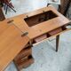 Vintage 1950s side desk with tapered legs.