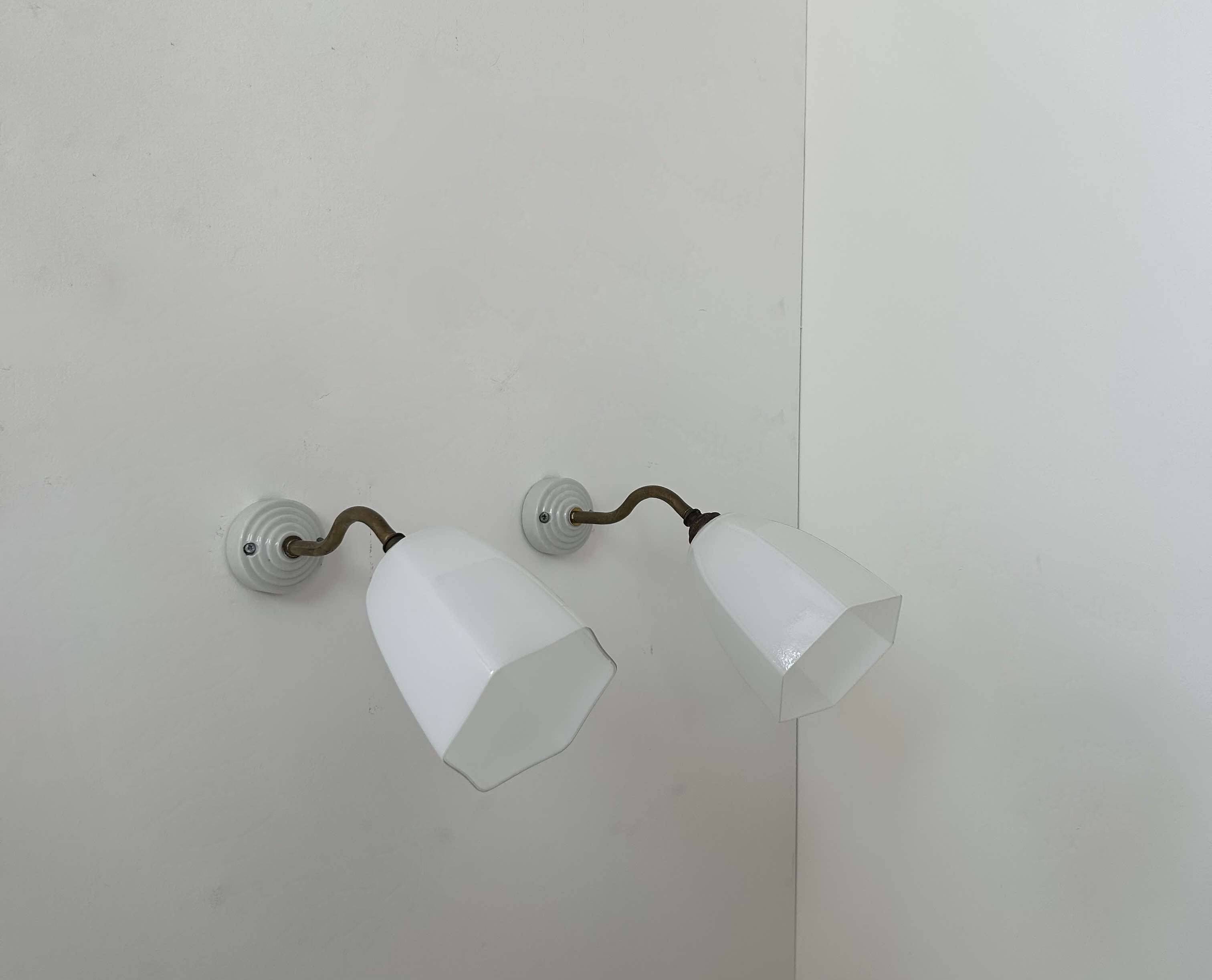 Pair of brass and opaline wall lights, France 1930