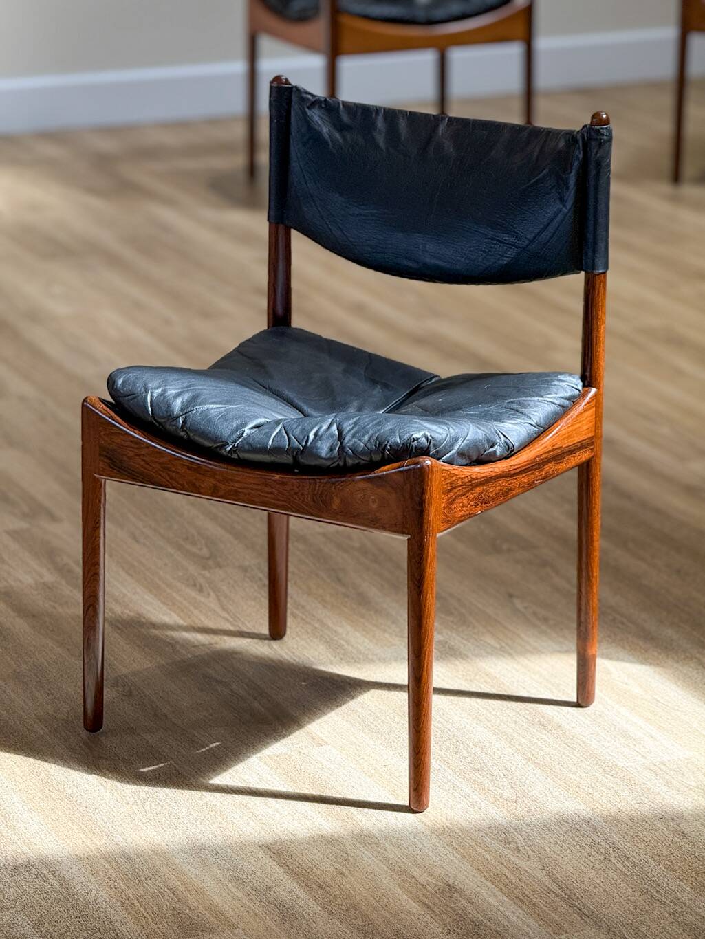 Extendable dining room table and chairs (by Kristian Solmer Vedel)