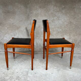 2 wooden and faux leather chairs in Scandinavian style