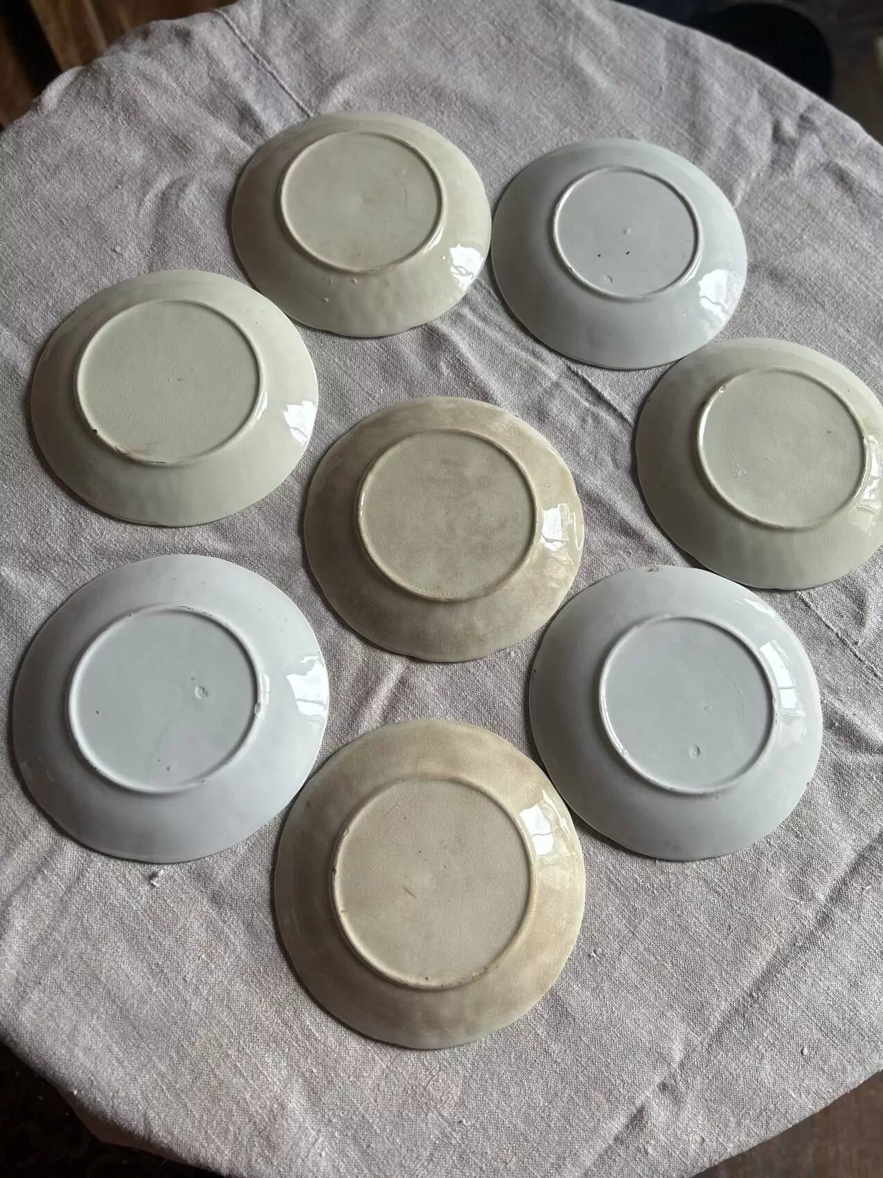 Set of eight flat dessert plates in barbotine earthenware with grape decoration – circa 1900.