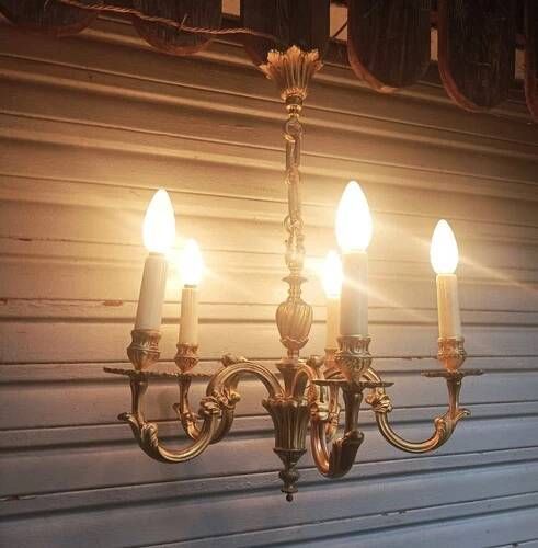 Antique gilded bronze chandelier in Louis XVI style, 5 lights, in working condition.