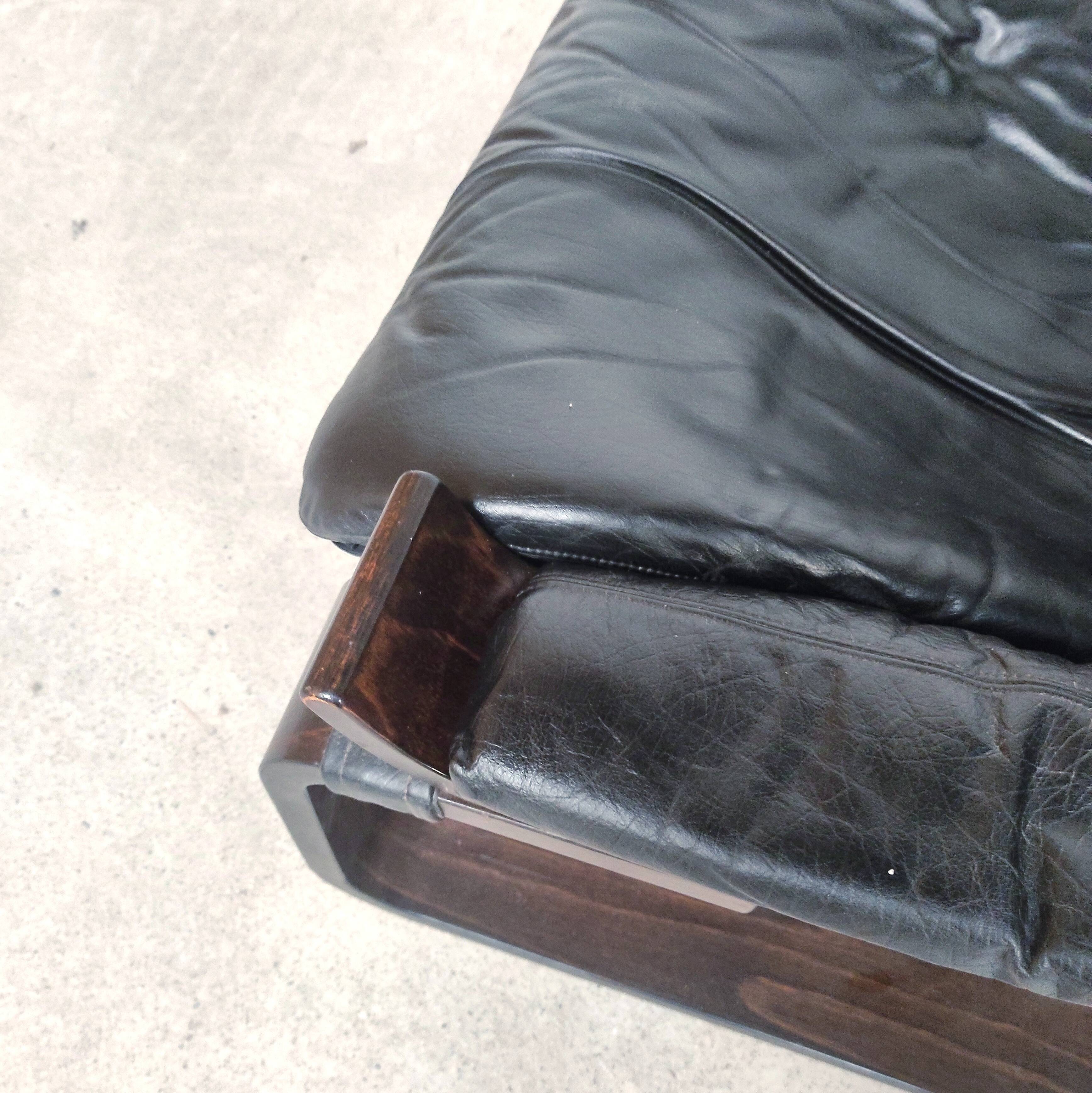 Pair of Kroken armchairs in black leather