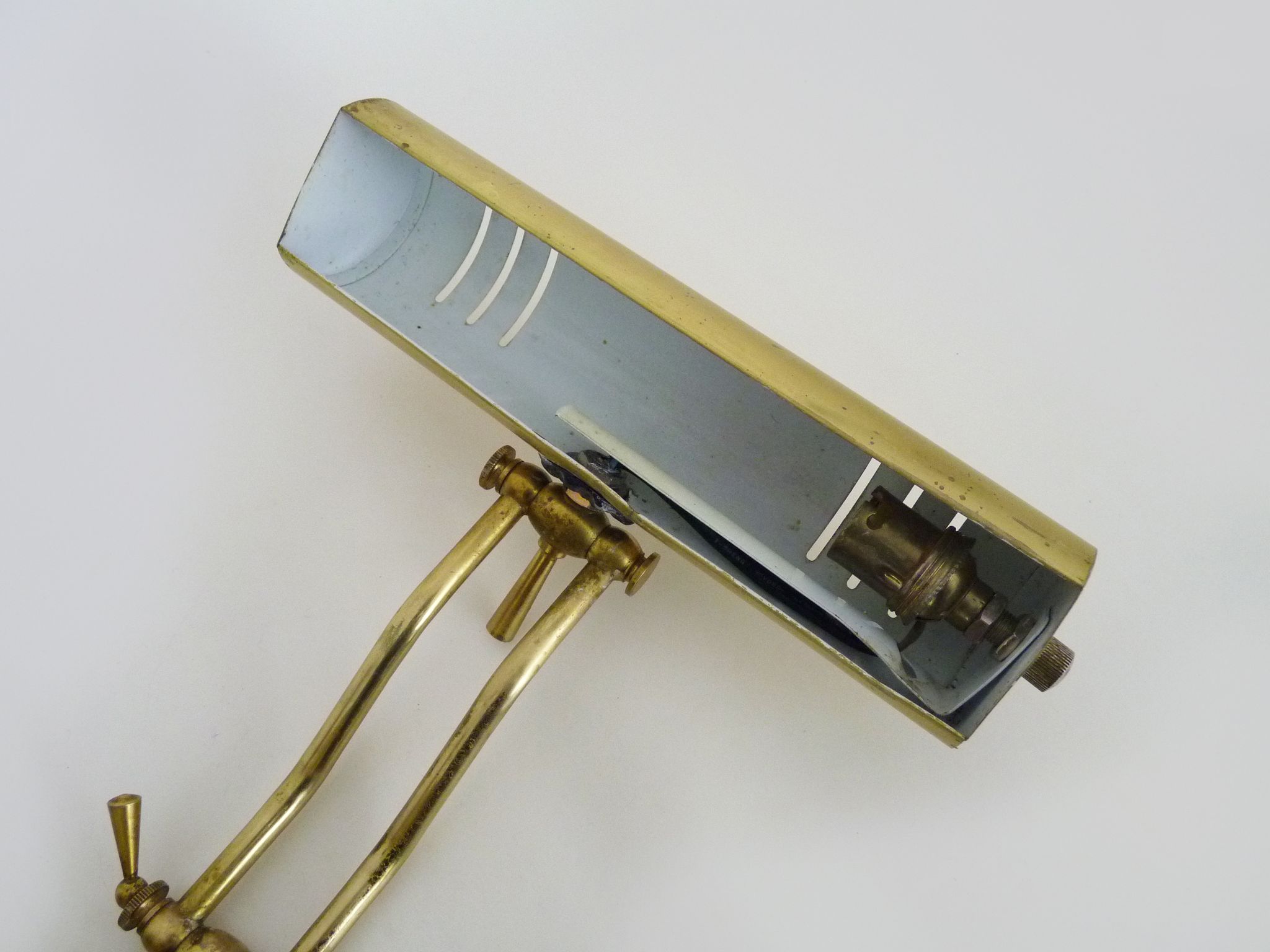 Old articulated piano lamp