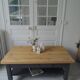 Coffee table on casters made from a vintage table, 1 drawer, 1 slate gray shelf.