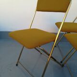4 folding gold vintage Eyrel chairs
