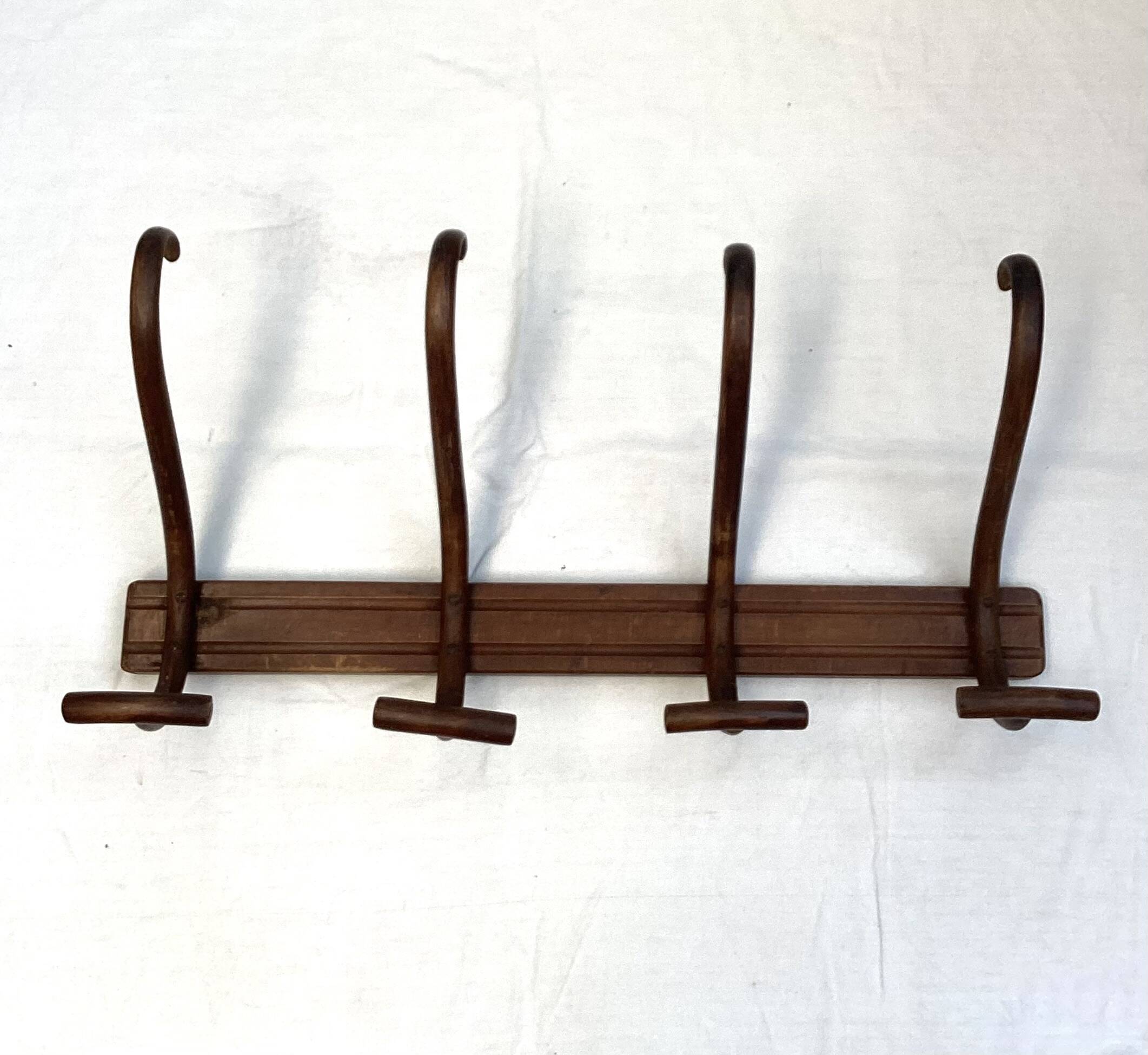 Coat rack signed Thonet with four hooks dimensions: height -32cm - width - 69cm-