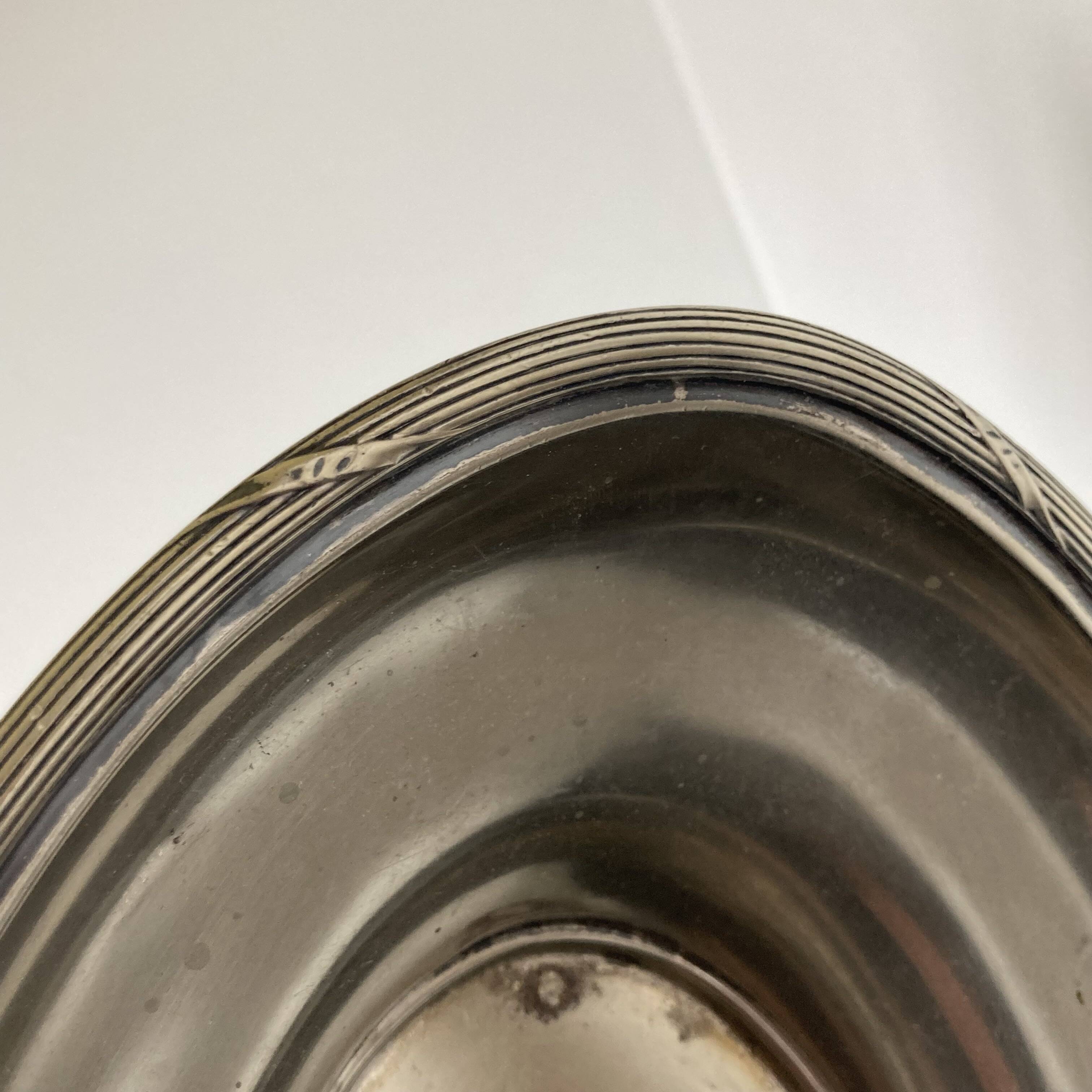 Oval silver-plated tray in the Louis XVI style by Mappin & Webb, London.