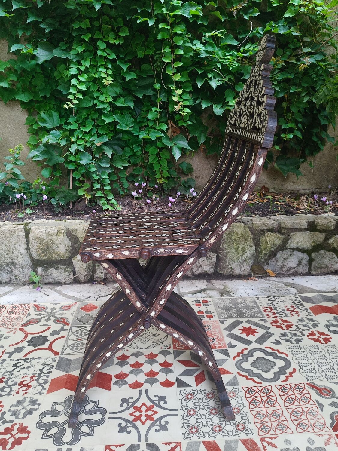 Antique folding oriental chair with mother-of-pearl inlays