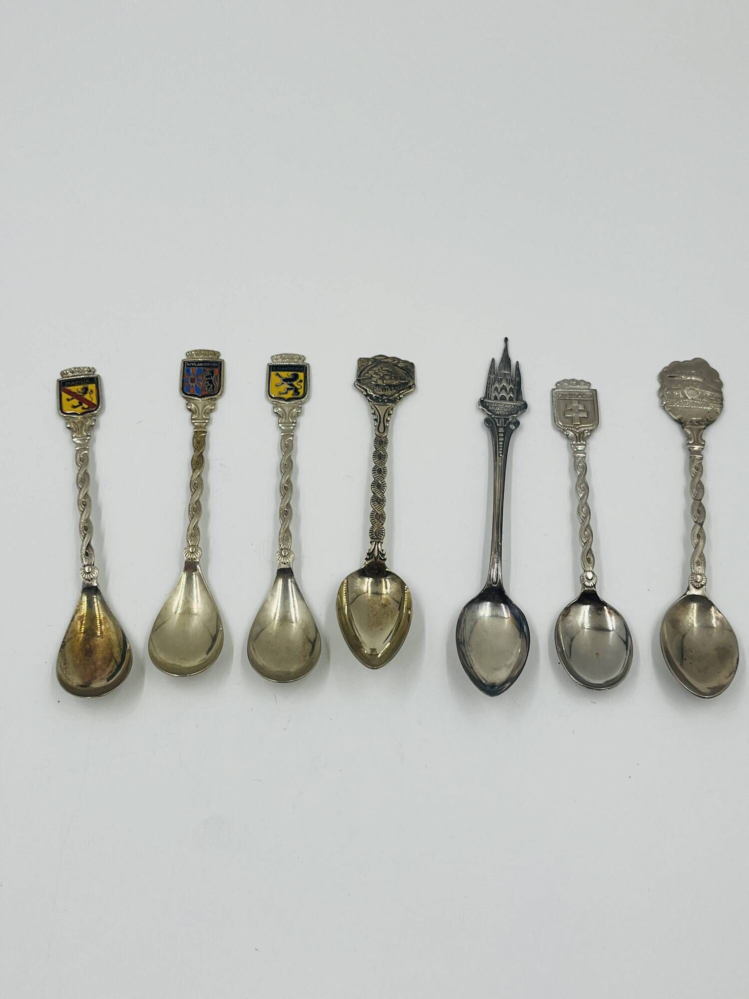 Set of 7 Heraldic Souvenir Spoons from Cities