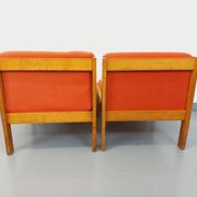 Set of 2 vintage Baumann armchairs in orange fabric and wood from the 80s