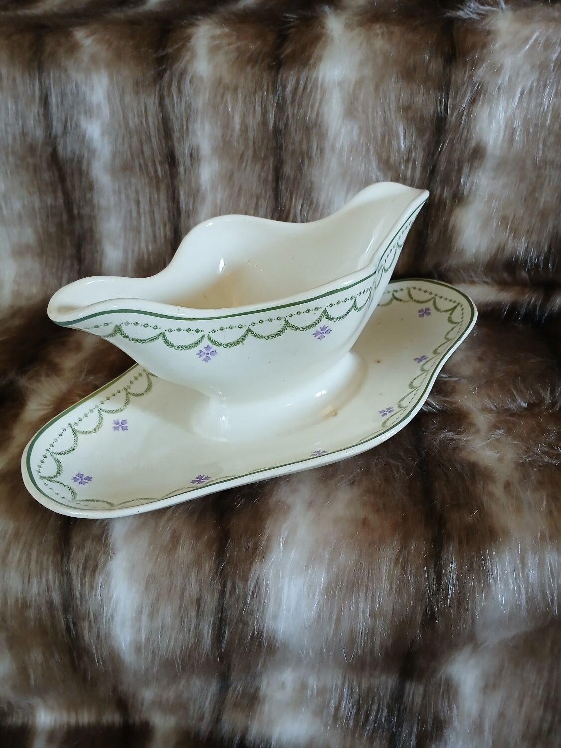 Antique sauce boat in Longwy ironstone.