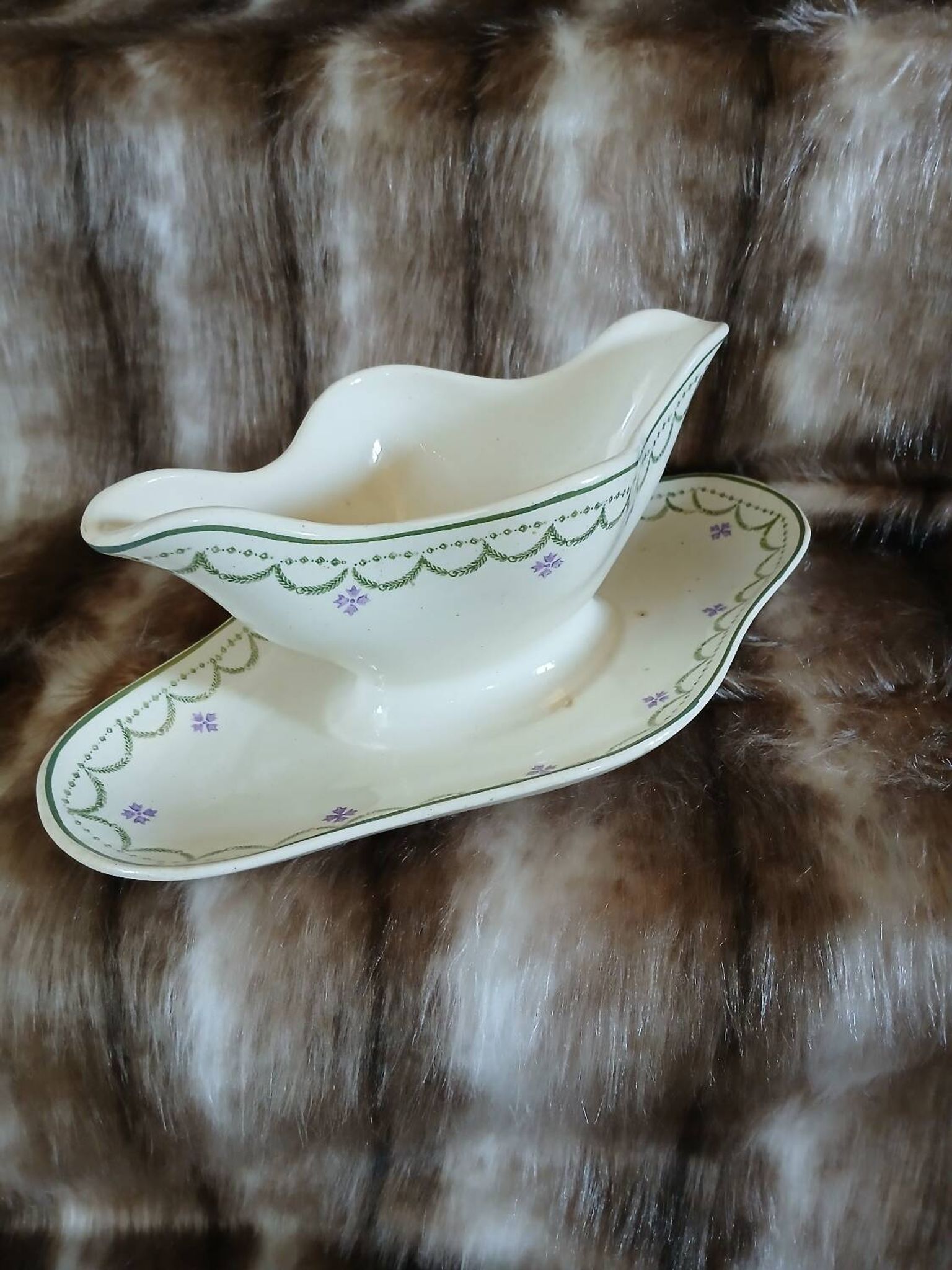 Antique sauce boat in Longwy ironstone.