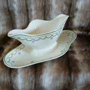 Antique sauce boat in Longwy ironstone.