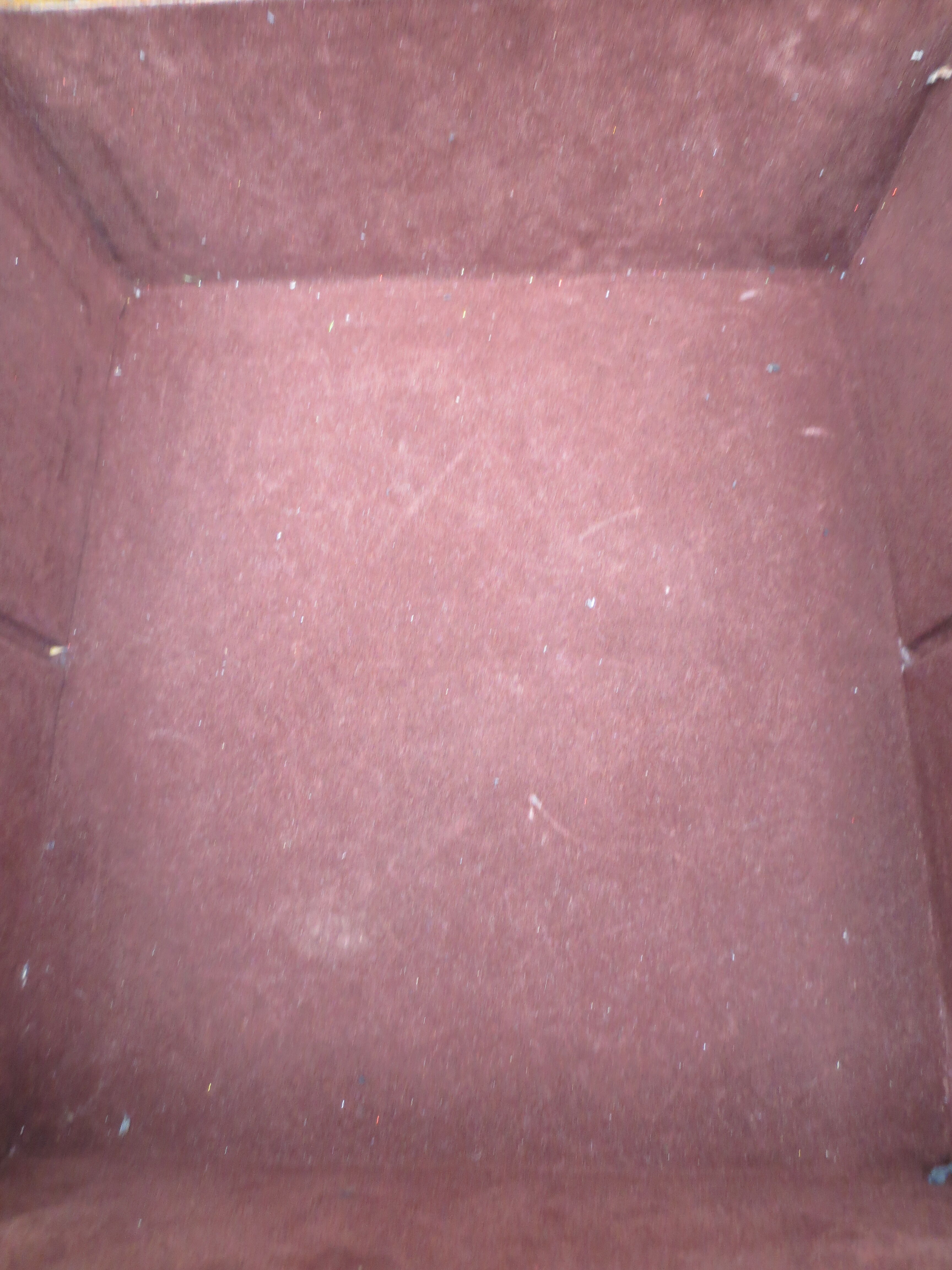 Rectangular wooden suitcase covered with leather