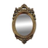 Small wall mirror in gilded wood, baroque style, 1940s-1950s.