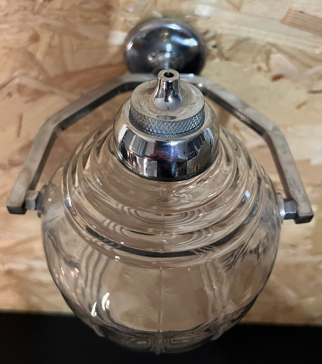 Old glass and metal liquid soap dispenser