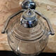 Old glass and metal liquid soap dispenser