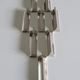Eight Boulenger knife holders in art deco silver metal