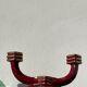 Art Deco burgundy red ceramic candlestick