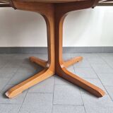 Baumann dining table 1960 extendable from 114 to 167 cm with integrated extensions.