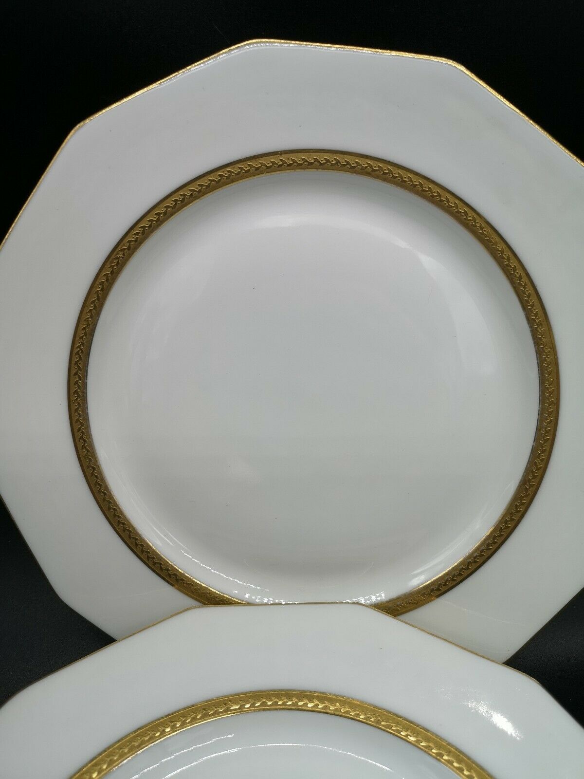 Lot of 4 porcelain dessert plates of white Limoges and double gilding
