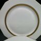 Lot de 4 assiettes à dessert en porcelaine de Limoges blanc et double dorure