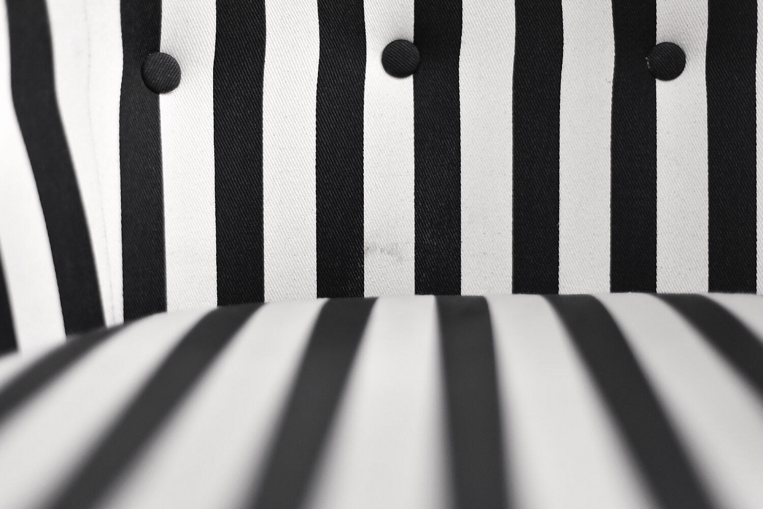 Mid-century modern Scandinavian rounded armchairs with black and white stripes, 1960s.