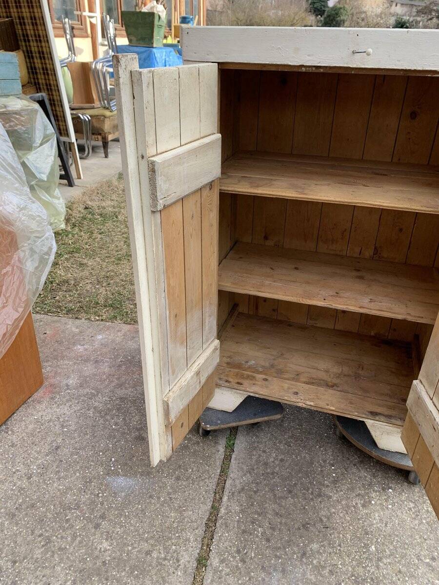 Antique beige-painted solid wood furniture, rustic late 19th-century cabinet with a single door.