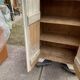 Antique beige-painted solid wood furniture, rustic late 19th-century cabinet with a single door.