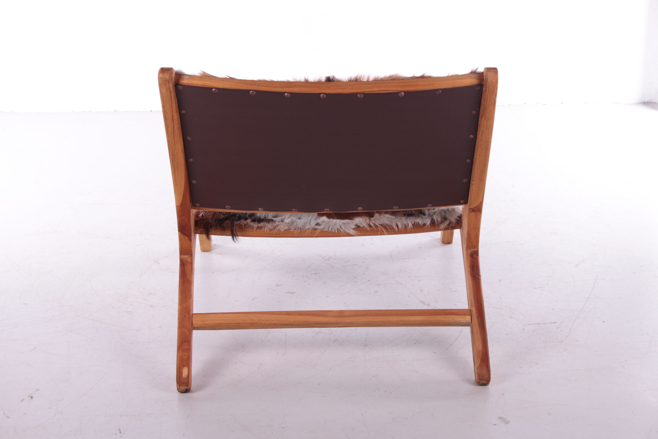 Vintage Relax chair upholstered with cowhide, 1970