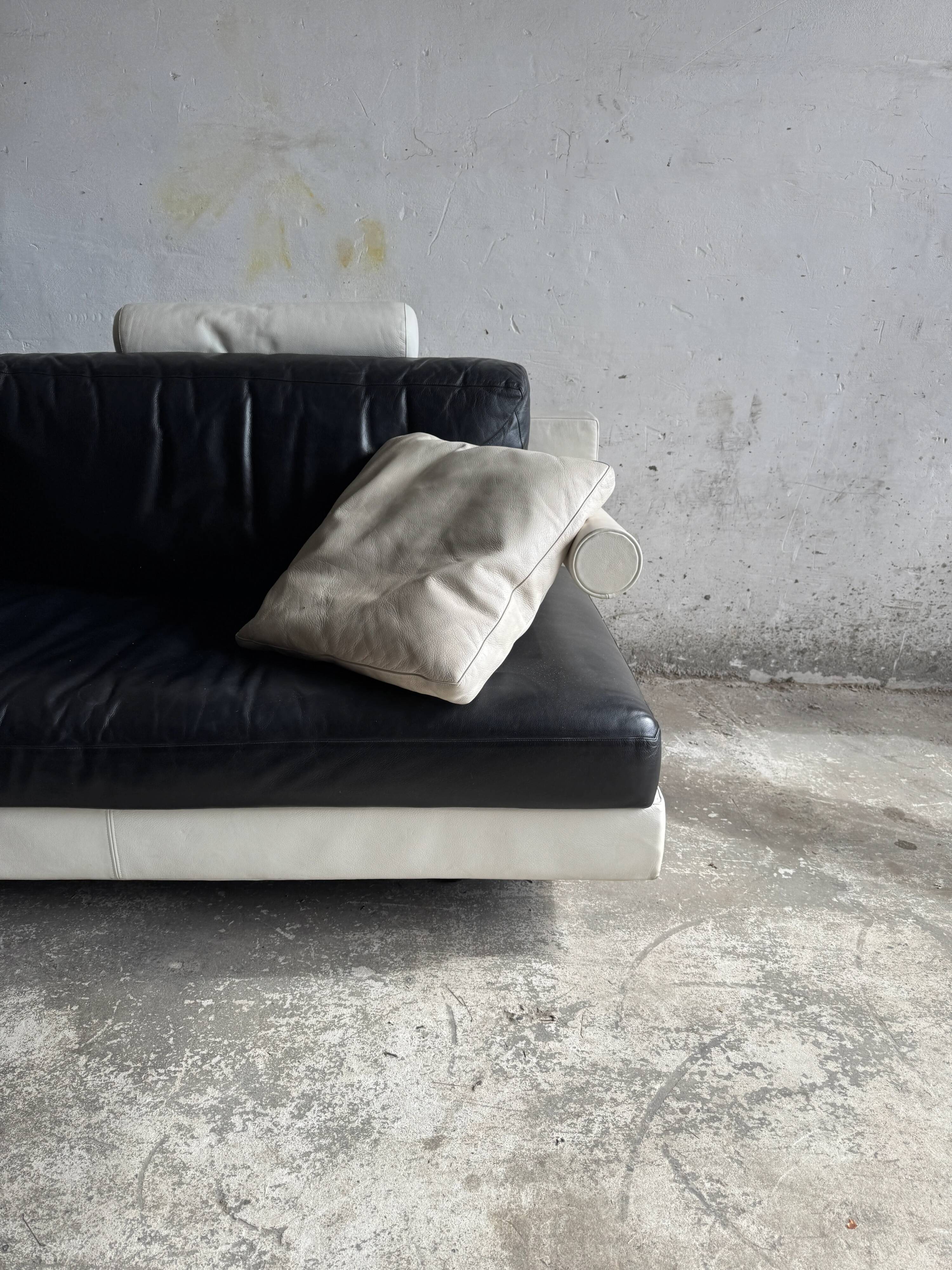 BnB Italia Sity 2-seater leather sofa — black seat with white leather base