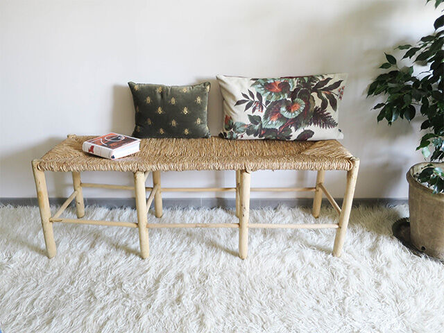Wooden bench and straw