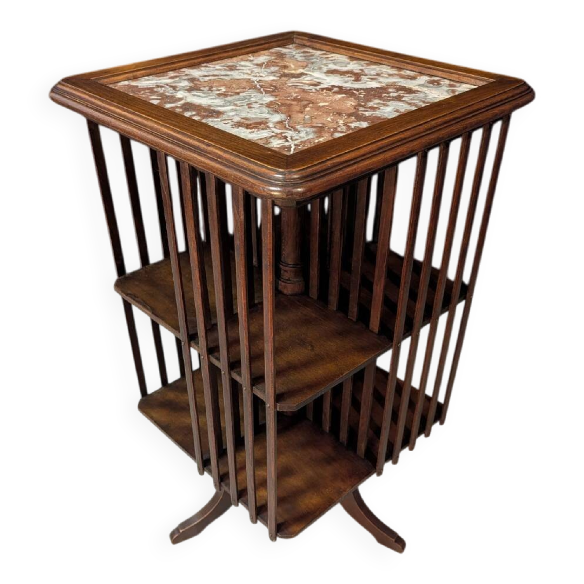 Rotating walnut library with a marble top.
