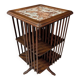 Rotating walnut library with a marble top.