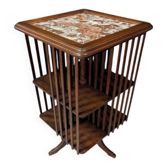 Rotating walnut library with a marble top.