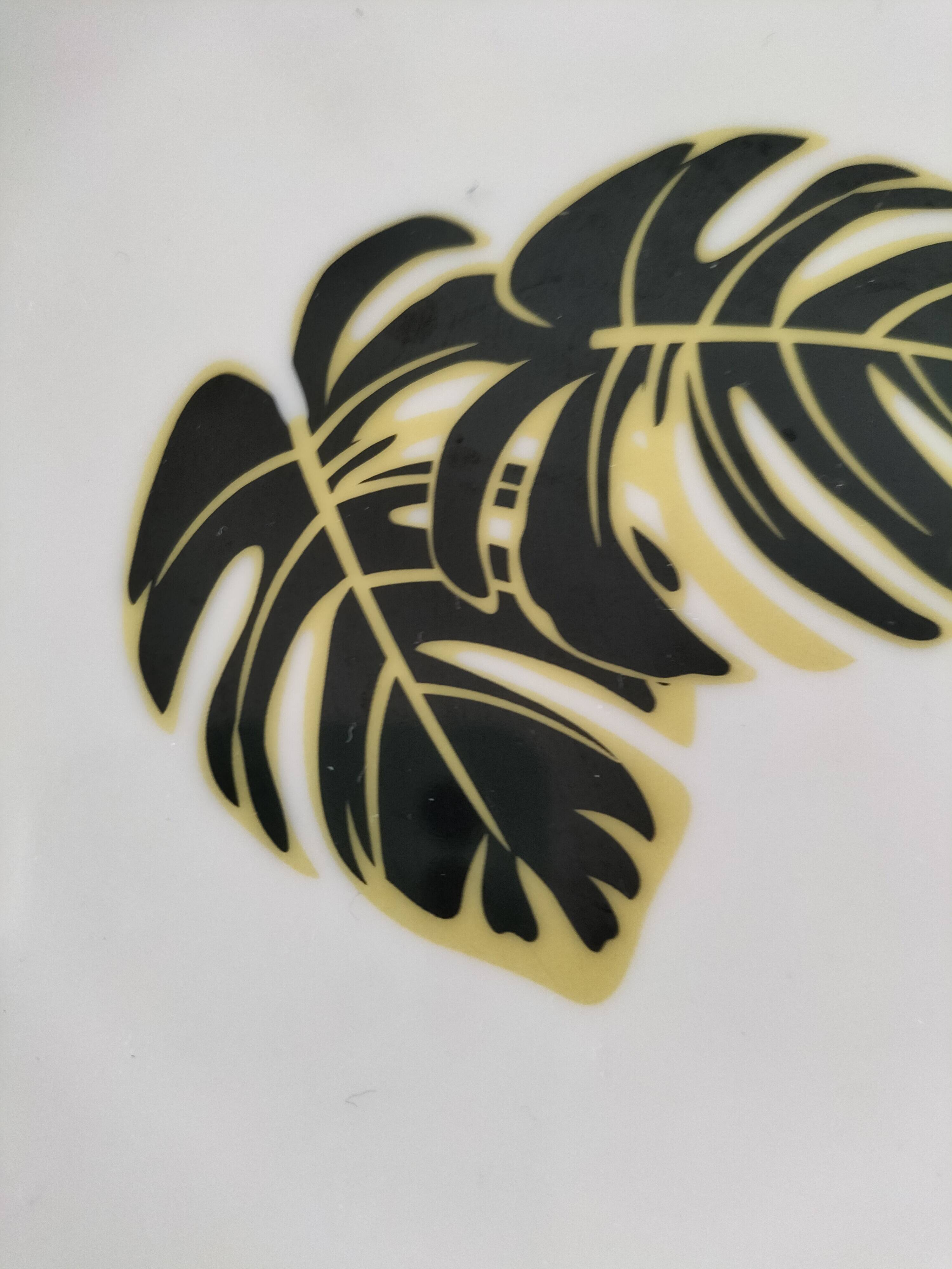 Set of 7 porcelain plates, gold foliage & jungle