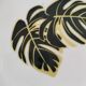 Set of 7 porcelain plates, gold foliage & jungle