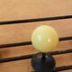 50s coat rack with multicolored balls