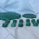 Set of 6 knife holders, a trivet, a 1960s bottle coaster
