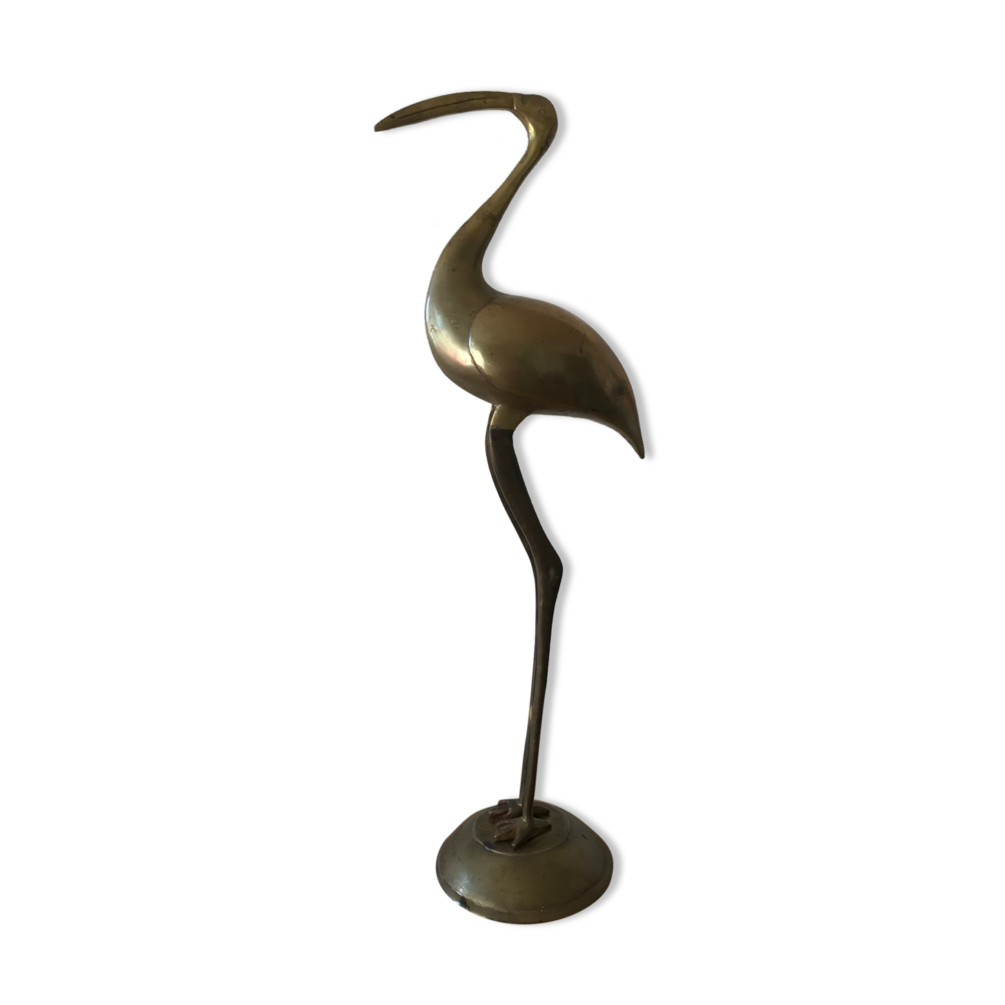 Brass wading bird