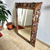 Carved wooden mirror