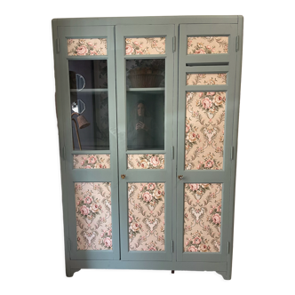 Carpeted glass cabinet